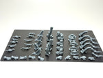 Resin-Bits aus dem Bitz Jar Undead Trenches: Sandsäcke, Holzpfähle, Schutt und Steinhaufen